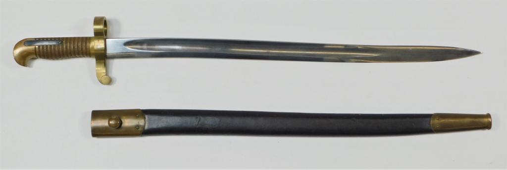 Remington 1863 Contract Rifle Bayonet: United States,C. 1862-65 Brass hilt, marked on the back flat near the muzzle ring "B.H.," marked on the right side of the guard "L" and on the left "S," marked on the ricasso "S," and a leather scabba