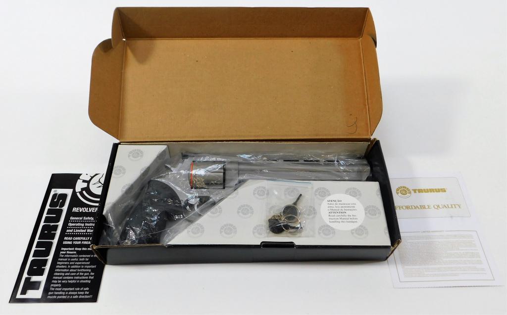 Taurus Model 44 CP Revolver: Brazil,C. 21st century .44 Magnum, serial number ZL445347, rubber grip, stainless finish, marked on the left side of the barrel "TAURUS," marked on the right side of the frame "TAURUS INT. MFG./MIAMI,
