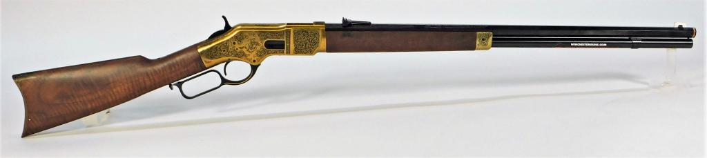 Winchester Model 66 Lever-action Rifle: Japan, .44-40 Winchester caliber, serial number M662016191, walnut stock, engraved brass fittings, brass receiver engraved with foliate designs and "WRA", engraved octagonal barrel marked "Winchester 