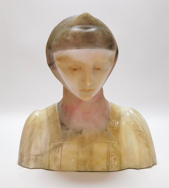 Italian Carved Alabaster Beatrice Bust: Italy,Late 19th- Early 20th Century Depicts a young woman with pointed chin and downcast gaze with head wrapped in a scarf tucked into a striped dress. Alabaster,Approx. 13 3/8" t x 12 1/2" w x 6 3/4"