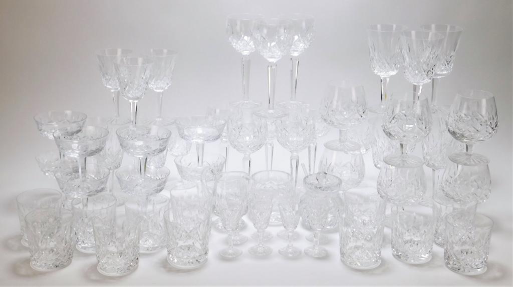 61PC Waterford Lismore Cut Crystal Stemware: Ireland,20th Century Includes eight water goblets, eight white wine glasses, eight red wine glasses, twelve tumblers, six brandy glasses, eight cordials, eight sherbet dishes, one sugar bowl, one crea