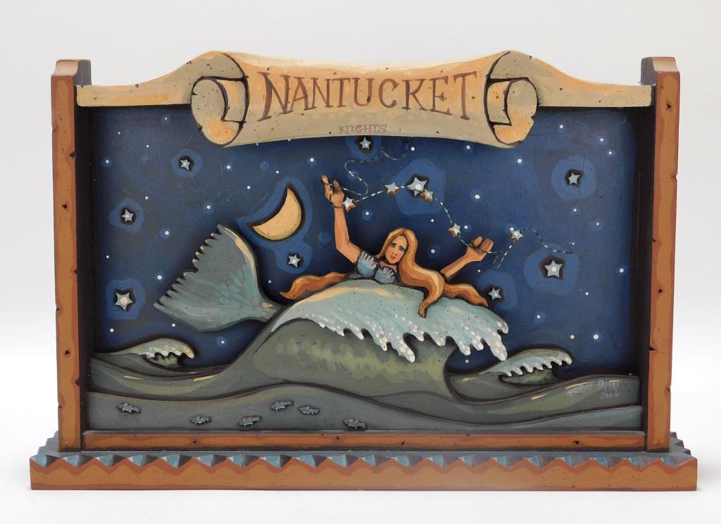 Maurice & Kelly Dallas Folk Art Mermaid Diorama: Maurice & Kelly Dallas United States,20th Century Depicts a mermaid with flowing hair riding a wave while holding a strand of stars over her head in a scrolled frame marked "Nantucket Nights." Wood,9 