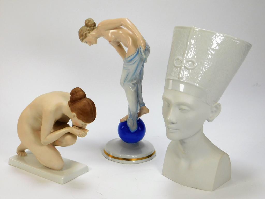 3PC Rosenthal Nude Figure Porcelain Group: Germany,Mid 20th Century Includes a Fortuna statue by Ernst Wenck depicting a partial nude woman draped in pale blue fabric standing on a bright blue ball, a crouching female nude with hands cupped in