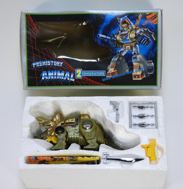 Period KO Transformers Diaclone Dinobot MIB NOS: Taiwan,Circa 1983 Box C8 with light warpage from age and storage, light corner and edge wear, slight yellowing to window, overall great graphics and displays well. Toy C9+ in new, never played with co