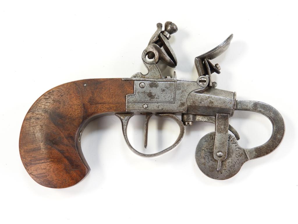 Flintlock Powder Tester: England C. late 18th/early 19th century Walnut grip, steel frame with engraved border lines, reinforced cock, and a steel measuring wheel with numbers on the right side. Overall lg. 6 1/8".