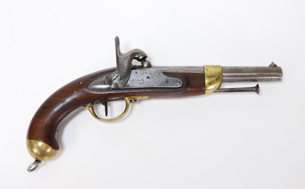 French Model 1822 Mutzig Conversion Pistol: C. 1822 .72 bore, walnut stock with "MUTZIG" stamped on the left side, brass fittings, side plate marked "F.M DE MODAVE/Madagascar 5 Janvier 1842," barrel tang marked "1822," breech has proof marks an