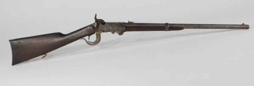 Burnside Fifth Model Carbine: United States C. 1863-65 .54 caliber, serial number 28134, walnut stock with an "A" carved on the right side of the butt, marked on the lock "BURNSIDE RIFLE CO/PROVIDENCE=RI," marked in front of the b