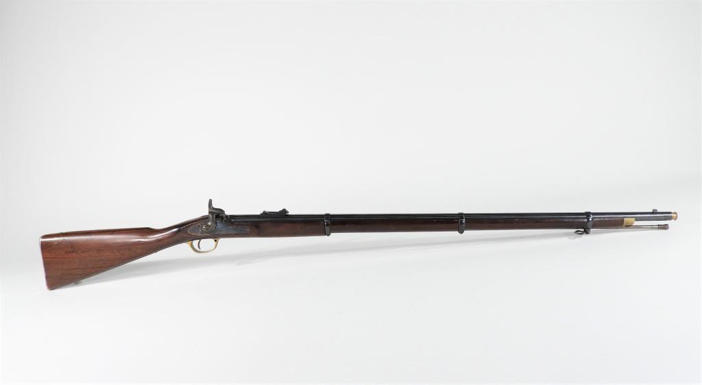 Reproduction P.1853 Enfield Rifle Musket: Italy C. late 20th century .577, serial number 32553, walnut stock, brass butt plate, trigger guard, and nose cap, steel barrel bands, case hardened lock marked with a crown and "LONDON ARMORY CO.," b