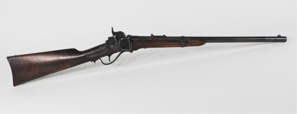 Reblued Sharps New Model Carbine: United States C. 1863-65 .52 caliber, serial number C988, reblued finish, and the lock has worn Sharps patent markings. Barrel lg. 22".Overall lg. 39"