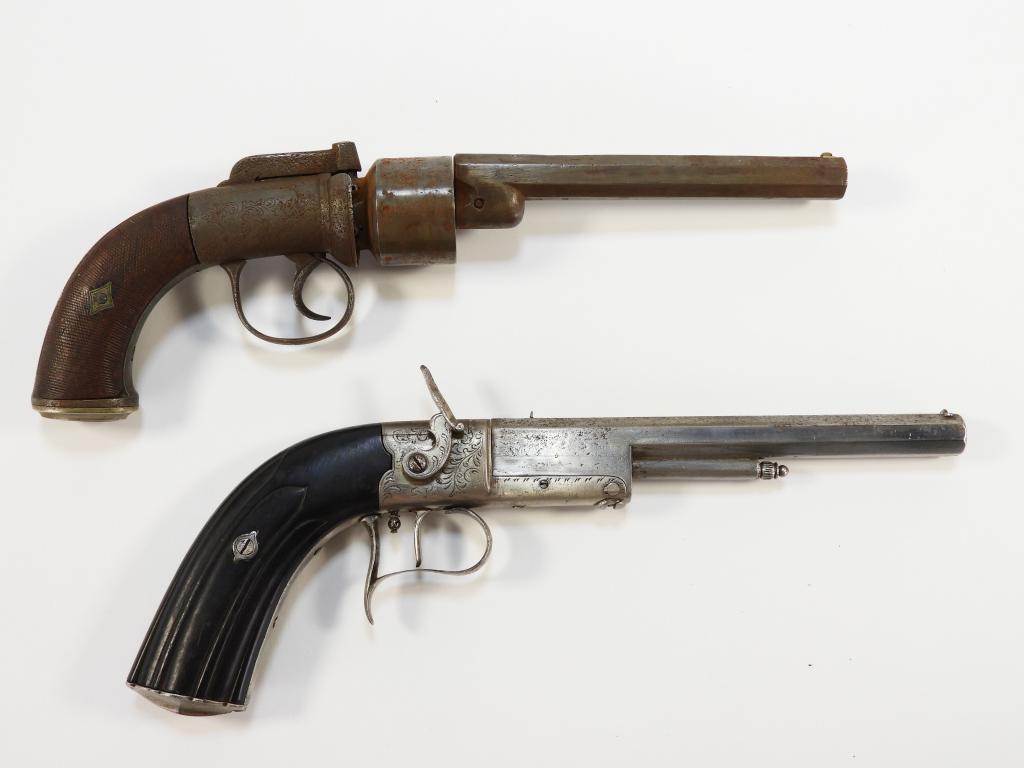 Two French or Belgian Pistols: France/Belgium Mid to late-19th century A bar hammer revolver with checkered walnut grips, engraved frame and nipple shield, six-shot cylinder, and octagonal barrel, and a French single shot pistol wi