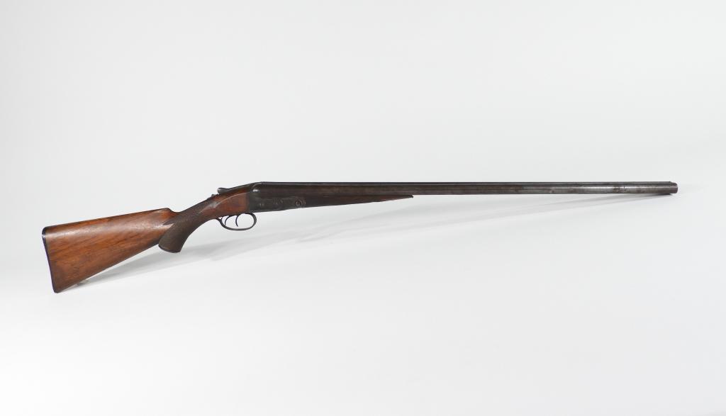 Parker Brothers Presentation Shotgun: United States C. 1897 12 gauge, serial number 84931, walnut stock with a small German silver escutcheon on the bottom of the butt, and a German silver escutcheon on the left side of the butt marked "P