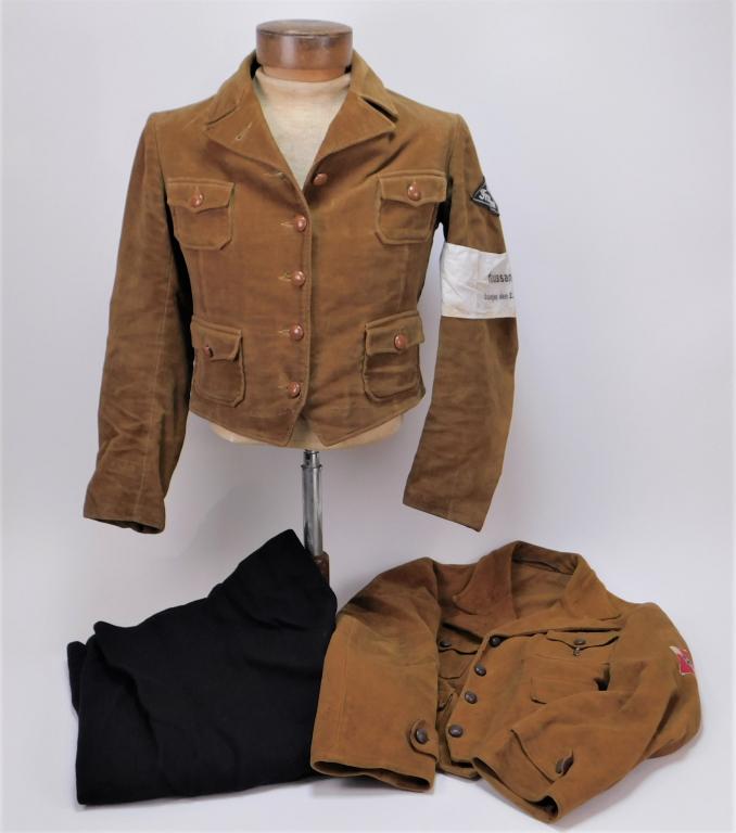 WWII German BDM Uniforms: Germany C. 1926-45 A light brown BDM jacket with a patch on the left sleeve marked "Sud/Franken," and an armband marked "Haussammlung/Erlangen, den 2. febr. 1936.," a light brown BDM jacket with an HJ