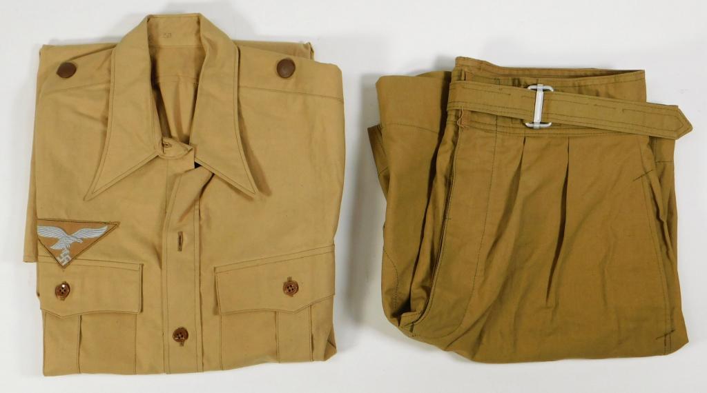 WWII German Unissued Luftwaffe Shirt and Shorts: Germany C. 1940s Unissued Luftwaffe tropical shirt with triangular patch above the right pocket, brown shirt buttons on the front and brown pebbled buttons on the shoulders, with maker mark on the ins