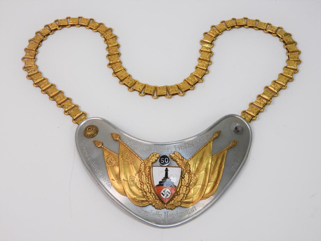 WWII German NSRKB Standard Bearer Gorget: Germany C. 1938 Aluminum gorget engraved "Krieger-Kam. Bollstedt" on the top, and "gew.v.Alvetr.-Wtw.," "Charlotte Nordmann/1938," "Geb. Hill." along the bottom, with applied Imperial and nazi flags,