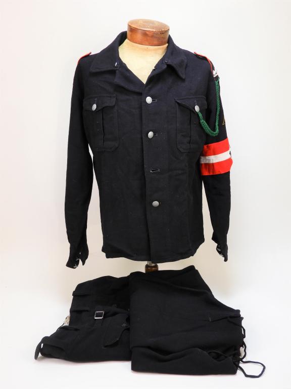 WWII German Hitler Youth Uniform: Germany C. 1926-45 Black button down winter shirt with pebbled buttons, black epaulets with red trim marked "107," green fourragÃ¨re, patch on the left sleeve marked "Mitte/Sachsen," an HJ armband, 