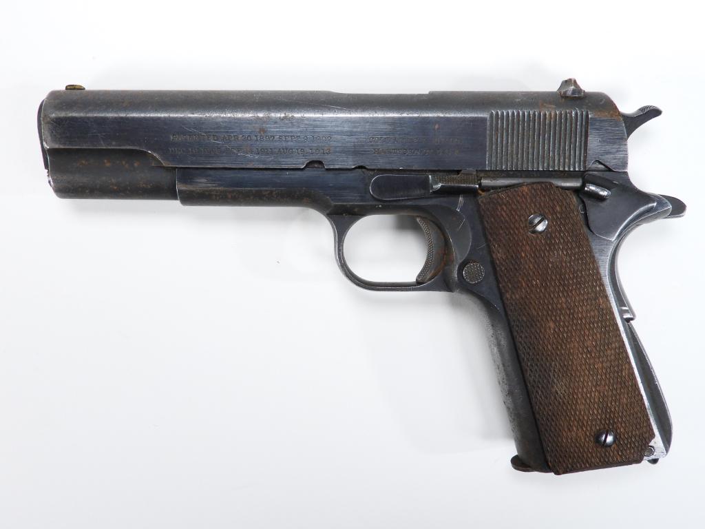 Colt Model 1911 Pistol with British Proofs: United States C. 1924 .45 ACP, serial number 703443, checkered walnut grips, marked on the left side of the slide "PATENTED APR. 20. 1897. SEPT.9.1902/DEC19.1905.FEB14.1911.AUG 19.1913" and "COLT'S PT