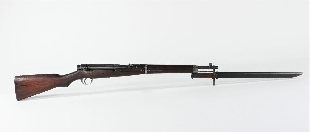 Japanese Type 38 Carbine and Bayonet: Japan C. 1939-45 6.5Ã—50mm Arisaka, serial number 003746, walnut stock, steel fittings, receiver ring has an intact chrysanthemum, dust cover, cleaning rod, bayonet and scabbard. Note: FFL/C&R Barr