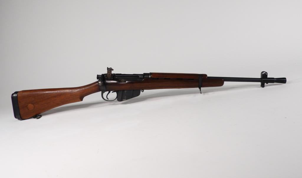 British Lee-Enfield No. 5 Mk. I Jungle Carbine: England C. 1944-47 .303 caliber, serial number 37860, blued finish, marked on the rear receiver ring with a crown over "GR," with a Lyman peep sight, blued magazine, and a blued flash hider. Note: FFL