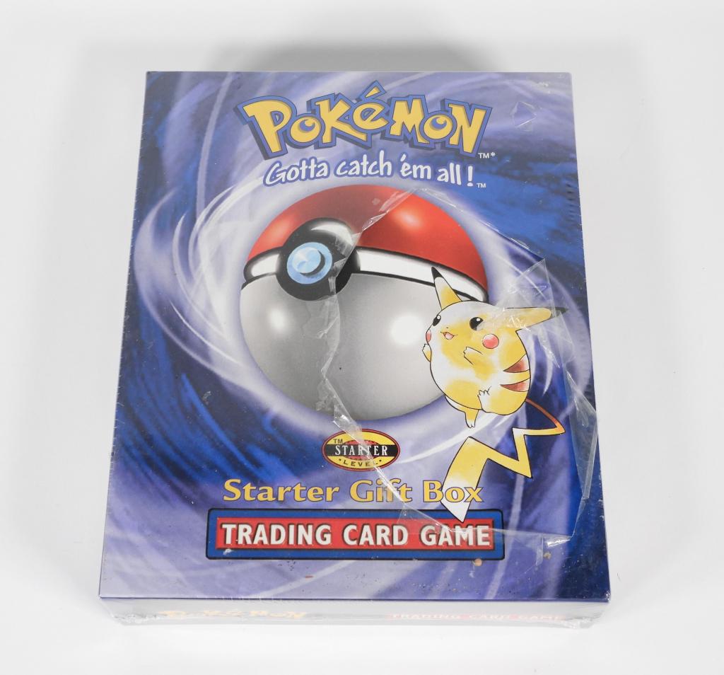 1999 Pokemon Starter Gift Box Cards Factory Sealed: United States,1999 1999 Wizards of the Coast Pokemon Starter Gift Box, factory sealed, large tear to cellophane as photographed, two small tears to cellophane on back, overall cellophane still tight o