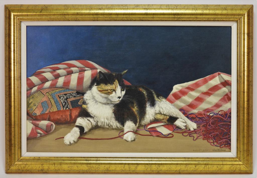 Richard A. Johnson Reclining Feline Cat Painting: Richard A. Johnson South Carolina b.1942 Depicts a calico cat with paws tangled in yarn laying against a flag and needle point pillow. Canvas 15" x 24".Frame 19 1/2" x 28 1/2",Oil on canvas From the c