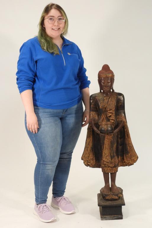 Tibetan Wood Carved Figure: ,Tibet,Early 20th Century Depicts a figure in gilt robes holding a vessel mounted on a lotus. Wood, 46" t x 17" w x 11" d. From the collection of a Westport,
