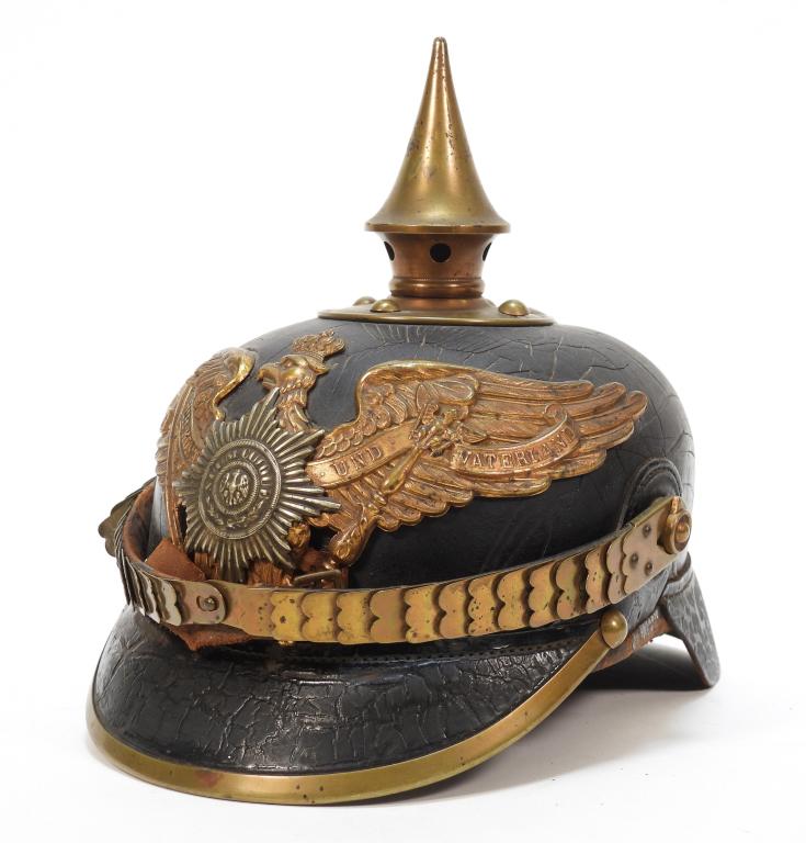 Prussian Model 1871 3rd Guards Pickelhaube: Germany,C. 1898 Black japanned leather shell, brass trim and hardware, black leather liner, marked on the inside of the back visor "3.G.R. 1893." Overall ht. 9 1/4".