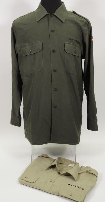 2PC Vintage Wahler Wu-Tang Clan Military Uniforms: United States,Circa 1995 Group includes two vintage Wahler Wu-Tang Clan military uniform shirts, one olive green with German flags and the other desert tan, both with embroidered "Wu-Tang" on front an