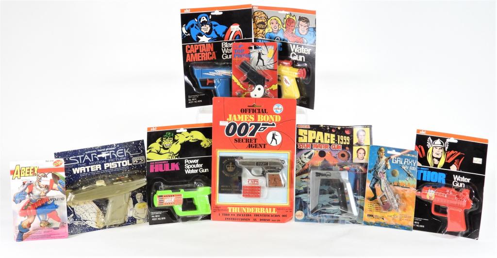 76-85 Pop Culture Cap Water Gun Novelty Toy Group: United States,1976-1985 Group includes 1976 Ahi Space: 1999 "Stun" water gun, four 1979 Ahi Marvel Comics water guns including Captain America, Fantastic Four, Incredible Hulk, and Thor, 1979 Edge Mar