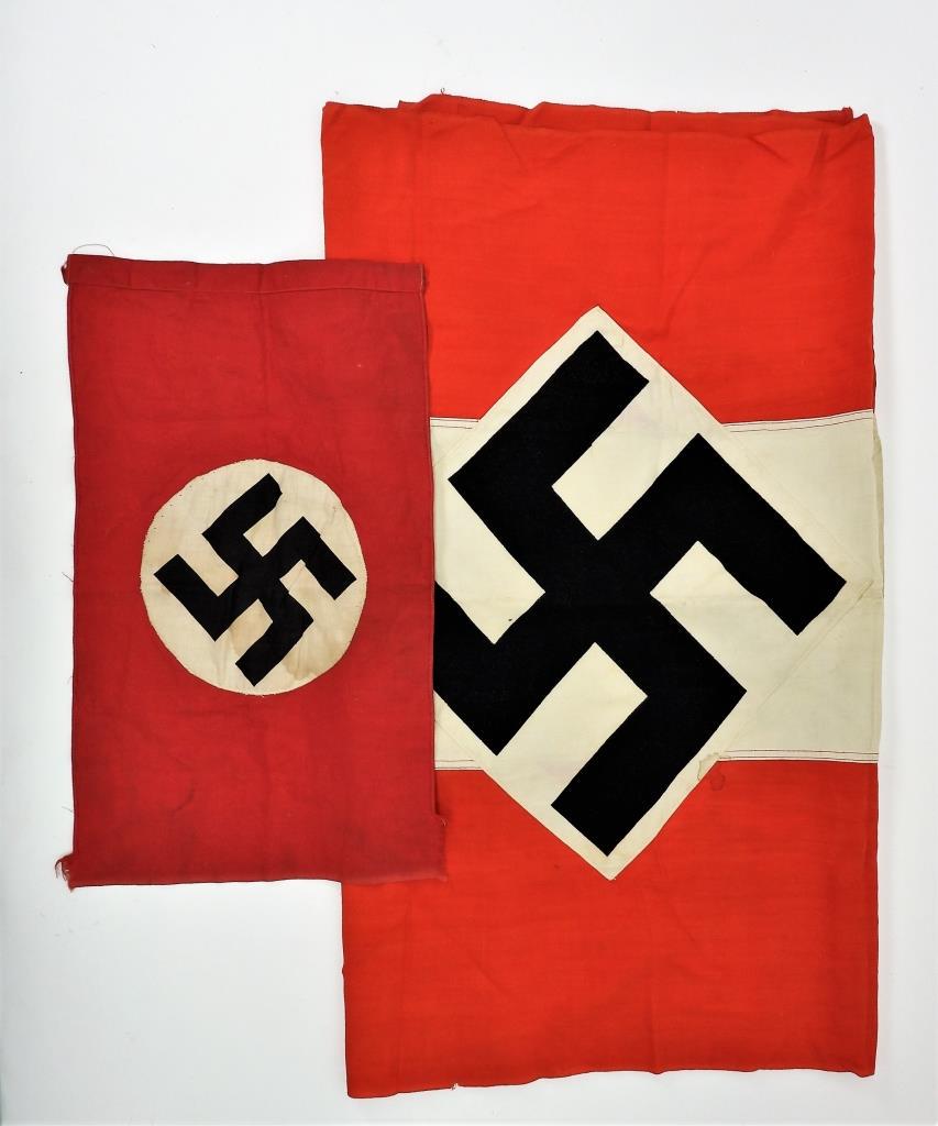 Two WWII German Banners: Germany, A Hitler Youth banner with red, white, and red stripes, and a central white diamond lozenge with a black swastika; and a small banner with red background, and applied white circle with a blac