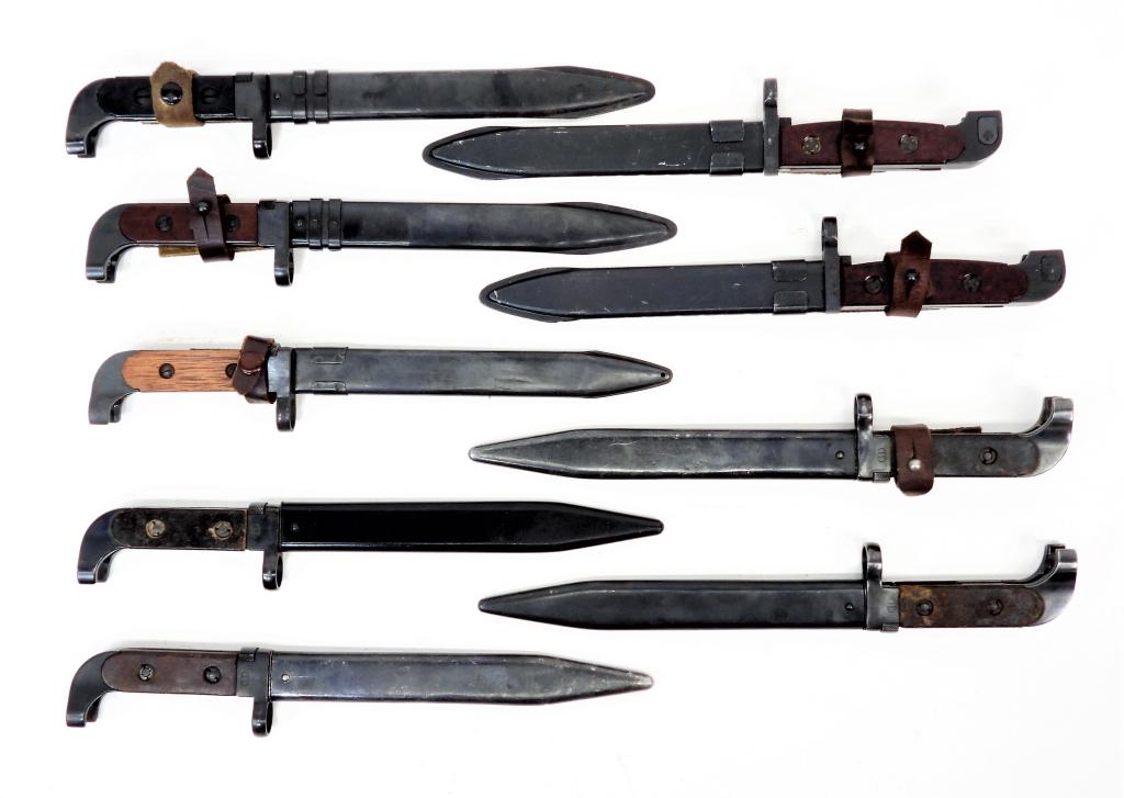 Nine AK-47 Bayonets and Scabbards: Russia/Poland/North Korea, Nine AK-47 bayonets from Russia, Poland, and two North Korean. 17.5% Buyers Premium with a 3% cash or check discount while bidding on OUR PLATFORM & APP ONLY. Third party 