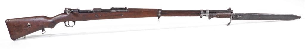 WWI German Gewehr 98 Rifle and Bayonet: Germany,C. 1915 8mm, serial number 54 not all matching walnut stock, receiver ring marked with a crown over "AMBERG/1915" with "Gew. 98." on the left side of the receiver, import markings on the right