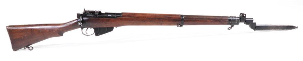 South African-marked Enfield No 4 MK I Rifle: England,C. 1949 .303 caliber, serial number PF 98096 all matching, walnut stock, brass butt plate with stamped South African Navy "SAN4816" number, left side of the receiver has small import marks and