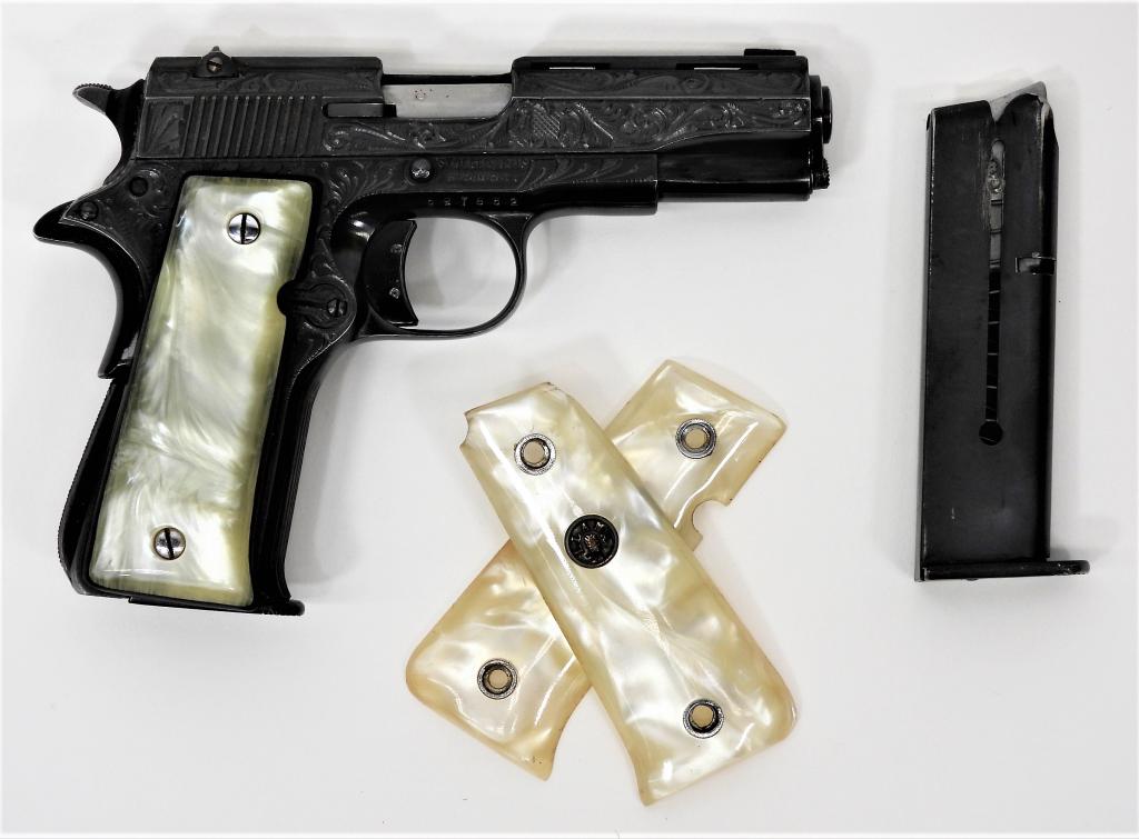 Engraved Llama 1-A Pistol: Spain, .22 caliber, serial number 597852, plastic mother of pearl grips, frame and slide engraved with foliate designs, marked on the right side of the frame "STOEGER ARMS/S.HACKENSACK.NJ.", marked on