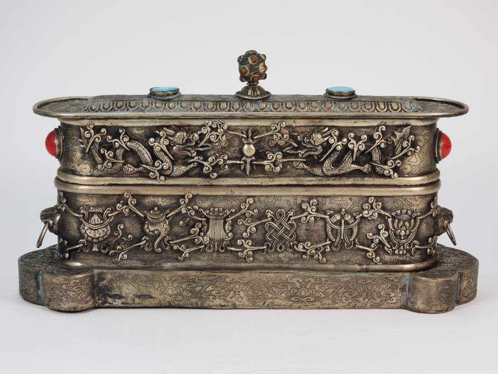 Tibetan Prayer Box w/ Bone Tiles: Tibet,20th Century Oblong box with shapely pedestal decorated with dragons, flaming pearls, censers, knots, and floral motifs. Box includes inscribed bovine bone tiles to interior. Metal, bone,Approx.