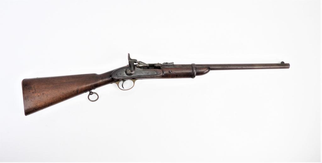 Snider Breech-loading Carbine: England,C. 1875 .577 caliber, serial number C494, walnut stock, brass butt plate and trigger guard, lock marked on the tail with a crown over "G.P", lock marked in front of the hammer "BSA &M Co./1875