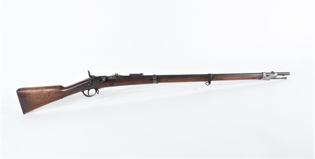 Belgian 1867 Albini-Braendlin Breech Loading Rifle: Belgium,C. 1868 11mm, serial number 671, walnut stock with arsenal stamp on the left side of the butt, steel fittings, marked on the left side of the barrel near the breech "1868", marked on the top o