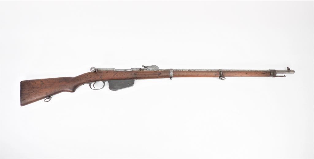 Austrian Model 1886 Mannlicher Infantry Rifle: Austria,C. 1886 8x50R caliber, serial number 7681C, walnut stock, breech of the barrel marked "S", and the receiver ring marked with the Steyr "WG" mark. Barrel lg. 30".Overall lg. 50 3/8"