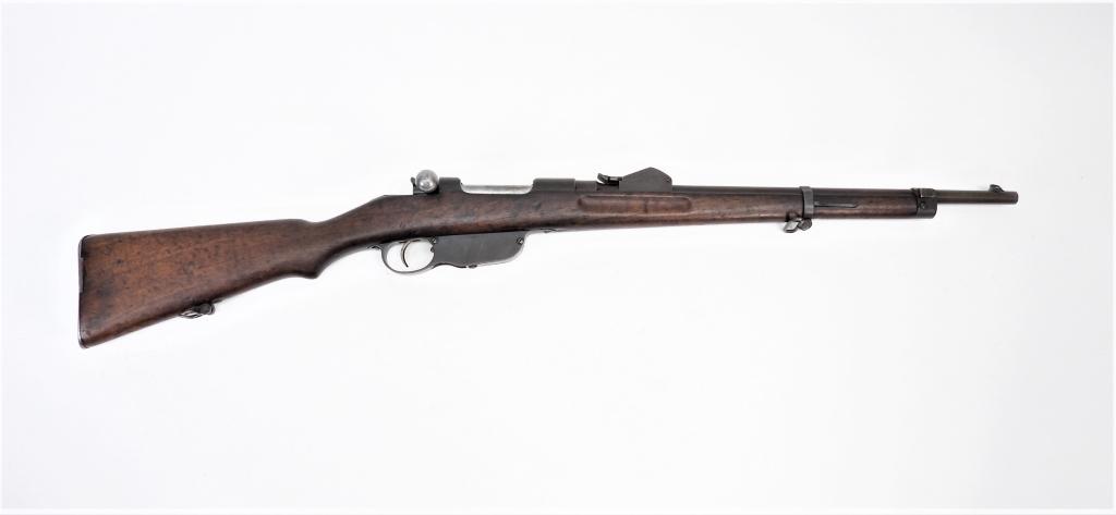Austrian Model 1890 Steyr Extra-Corps Carbine: Austria,C. 1892 8x50R caliber, serial number 165 on the receiver and barrel, 1735 on the bolt, walnut stock with a cleaning rod compartment in the butt, marked on the receiver ring "WG/STEYR", and mar