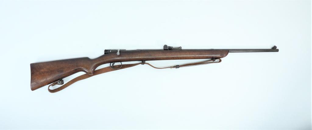B.S.A. Model 1907 Military Training Rifle: England,C. 1907 .22 caliber, serial number 2832, walnut stock with B.S.A. "TRADE MARK" and stacked muskets on the left side of the butt, brass butt plate, blued finish, marked on the top of the barrel