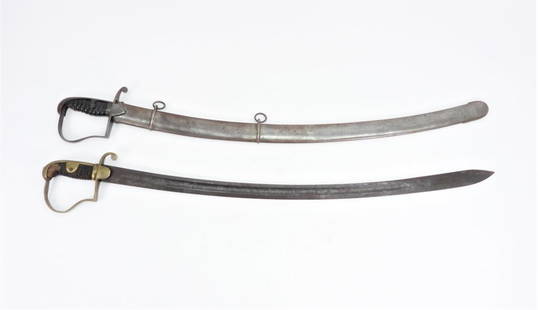 Two Cavalry Sabers: A British Pattern 1796 cavalry saber and scabbard; and a brass hilted cavalry saber with no scabbard.