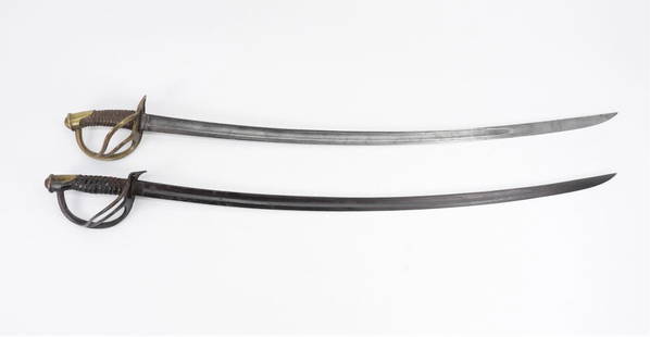 Two Cavalry Sabers: A U.S. Model 1860 Light Cavalry Saber made by Lamb with a brass hilt (bent quillon and missing wire wrap); and an imported K&C Solingen Model 1840 Cavalry Saber.