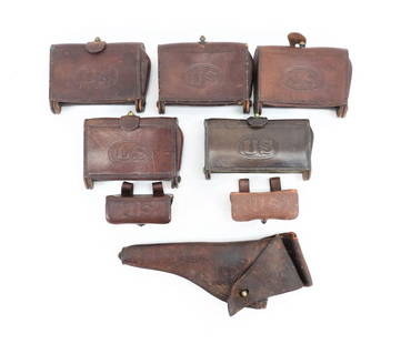 Group of U.S. Leather Equipment: United States Five McKeever cartridge boxes; two Model 1896 .38 pistol ammunition pouches; and a .38 revolver leather holster.