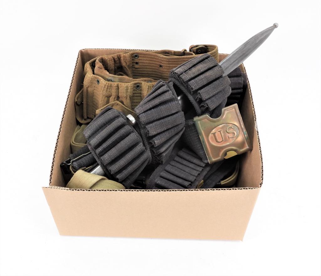 Group of Web Gear: United States Seven Kerr rifle slings; a Model 1910 9 Pocket Mills belt with eagle snaps; a Model 1887 Mills belt with a Krag-Jorgensen Bayonet; and a late 1890s single row belt.