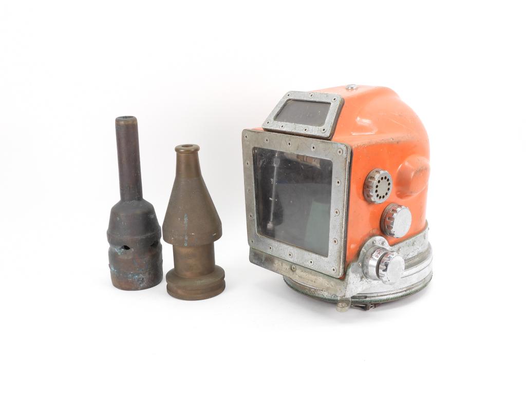 Swindell Mixed Gas Orange Diving Helmet & Nozzles: United States C. 1970s A Swindell free flowing orange diving helmet numbered 696; a bronze under sea jetting nozzle; and a bronze Falcon-type jetting nozzle.