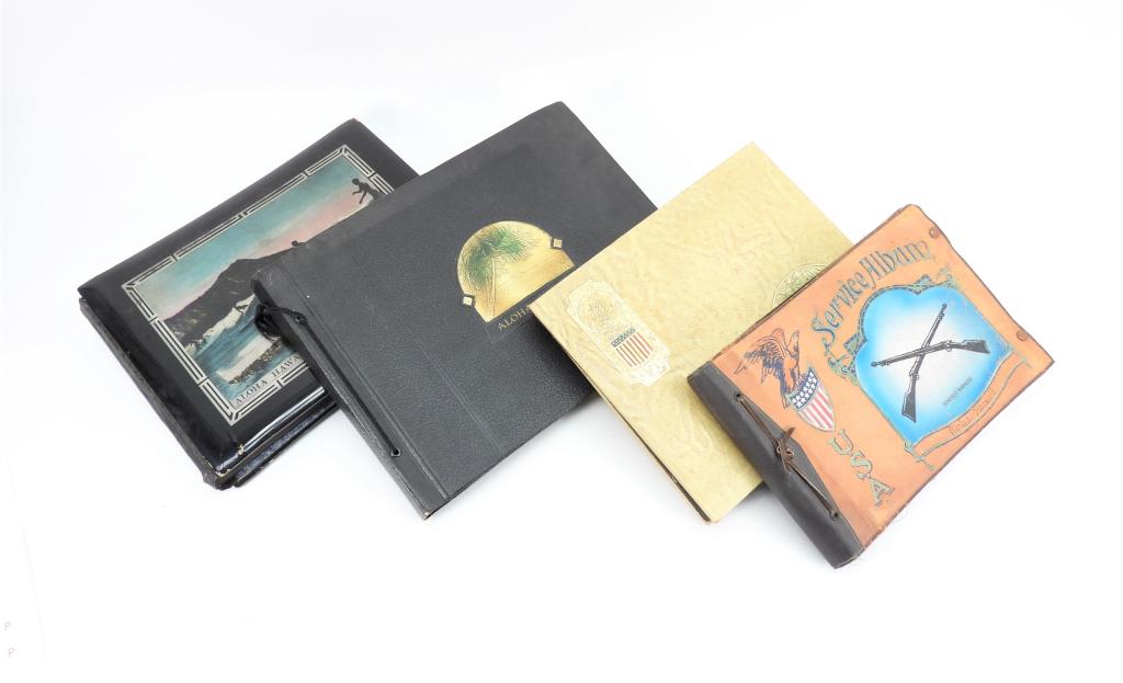 Four Military Photo Albums From Hawaii: United States C. 1940-44 A photo album from Schofield Barracks in Hawaii with large images of Hawaii, bases, airplanes, USO shows with images of Bob Hope, and personal images; a photo album from Hawai