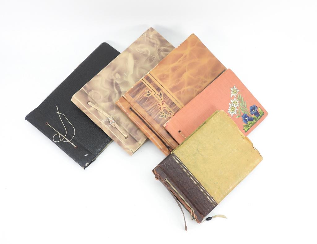 Five German WWII Photo Albums: A photo album with family pictures, Luftwaffe officer's and enlisted men, Hitler Youth, and school photos with approximately 185 images; a photo album with a lot of family images, and a few dated 1939