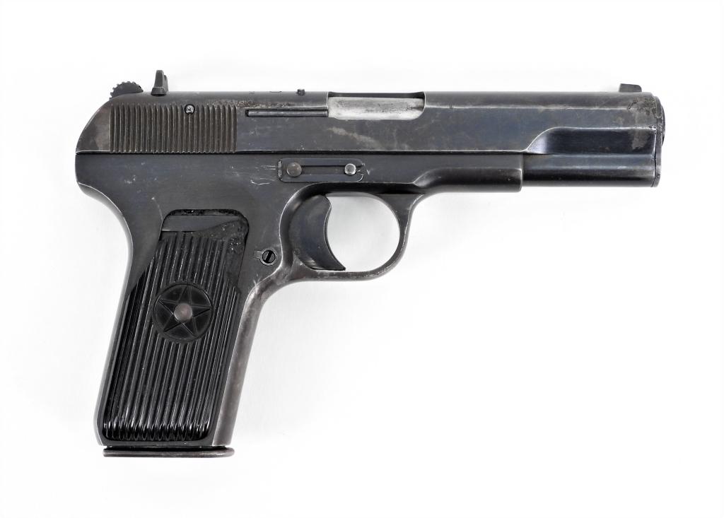 Chinese Model 20 "Export" Tokarev Pistol: China 7.62x25mm, serial number N1201904 all matching including the magazine, black ribbed plastic grip with a star (damage to right grip), blued finish, no import markings, and marked on the top rear