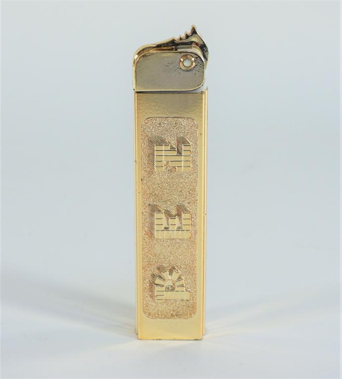 1955 PEZ Golden Glow Dispenser Exceptional Shape: Austria,1955 1955 model PEZ Golden Glow Regular dispenser, overall exceptional example with minimal wear and vibrant gold chrome, 2.62 patent number with "MADE IN AUSTRIA" mark, please refer to photog