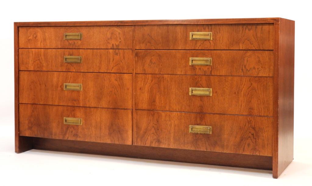 Founders Furniture Company MCM Dresser: Founders Furniture CompanyUnited States Mid 20th Century Eight drawer graduated rectangular chest with brass hardware. Designed by Jack Cartwright for Founders Furniture Company. 64" wide x 19" deep x