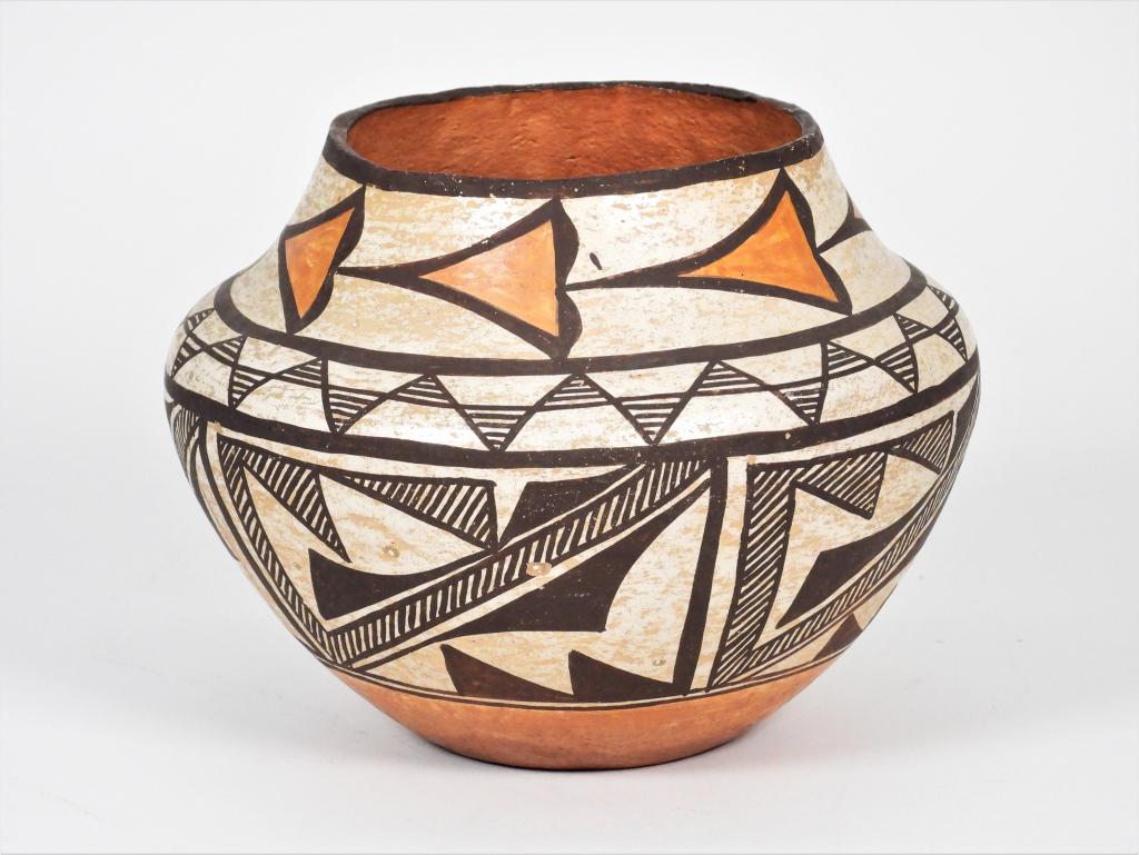 Native American Acoma Geometric Pottery Bowl: United States,20th Century Squat vessel decorated with orange, brown, and white geometric patterns. Pottery,Approx. 4 3/4" x 6" dia.. Unmarked. From the collection of a Marstons Mills, Massachusetts e